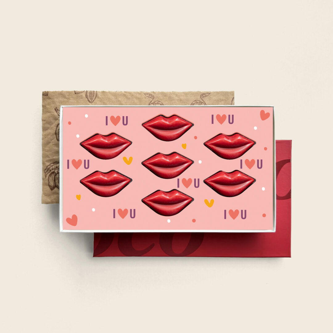 Heerlijke luxe bonbons in de vorm van rode chocolade lipjes in een luxe geschenkdoos met mmoderdag design. Ook leuk voor Valentijn. Tasty Present - Gepersonaliseerde chocolade en zoetwaren