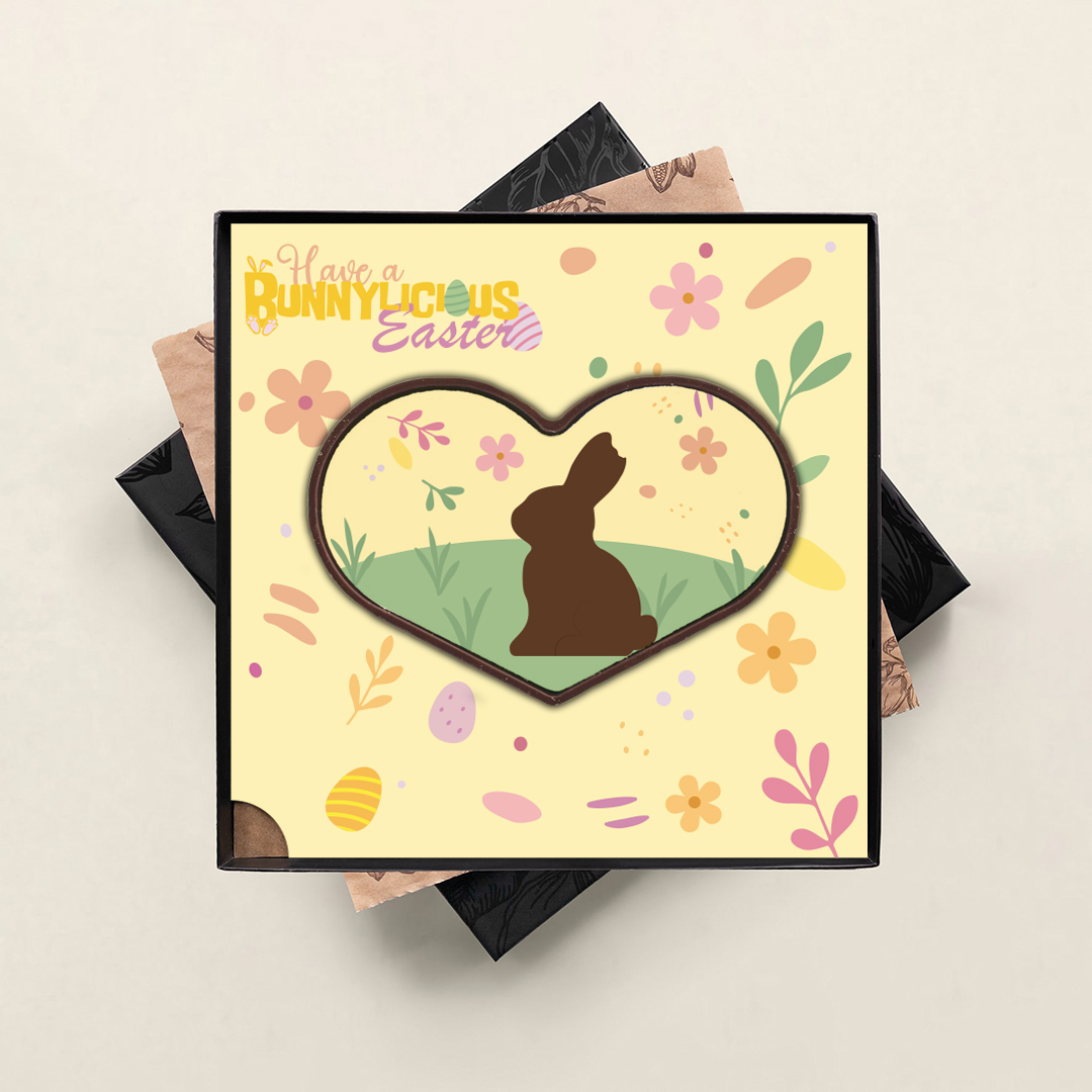 Chocolade hart voor Pasen in luxe zwarte geschenkdoos met vrolijk Bunnylicious thema design. Tasty Present - gepersonaliseerde chocolade